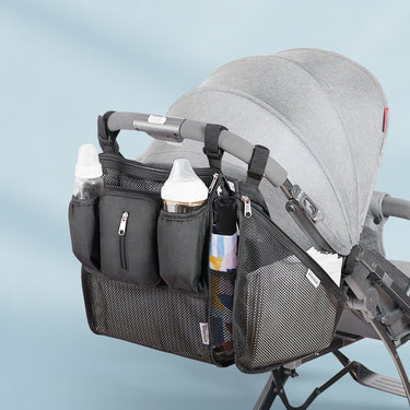 stroller organizer strapped to a stroller