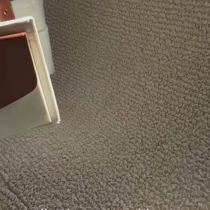 Mother organizing diapers and wipes inside the Olnna Baby Caddy during a diaper-changing routine.